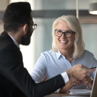 woman mentoring employee